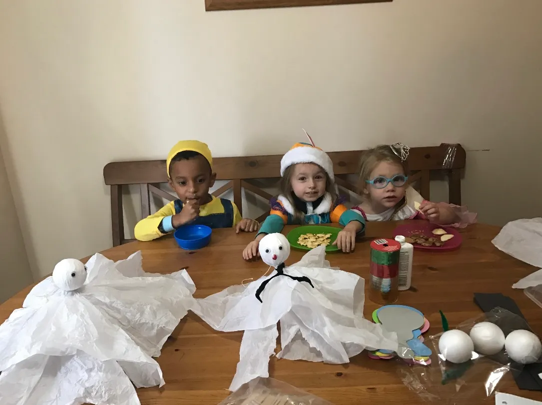 Photo of daycare kids creating halloween art